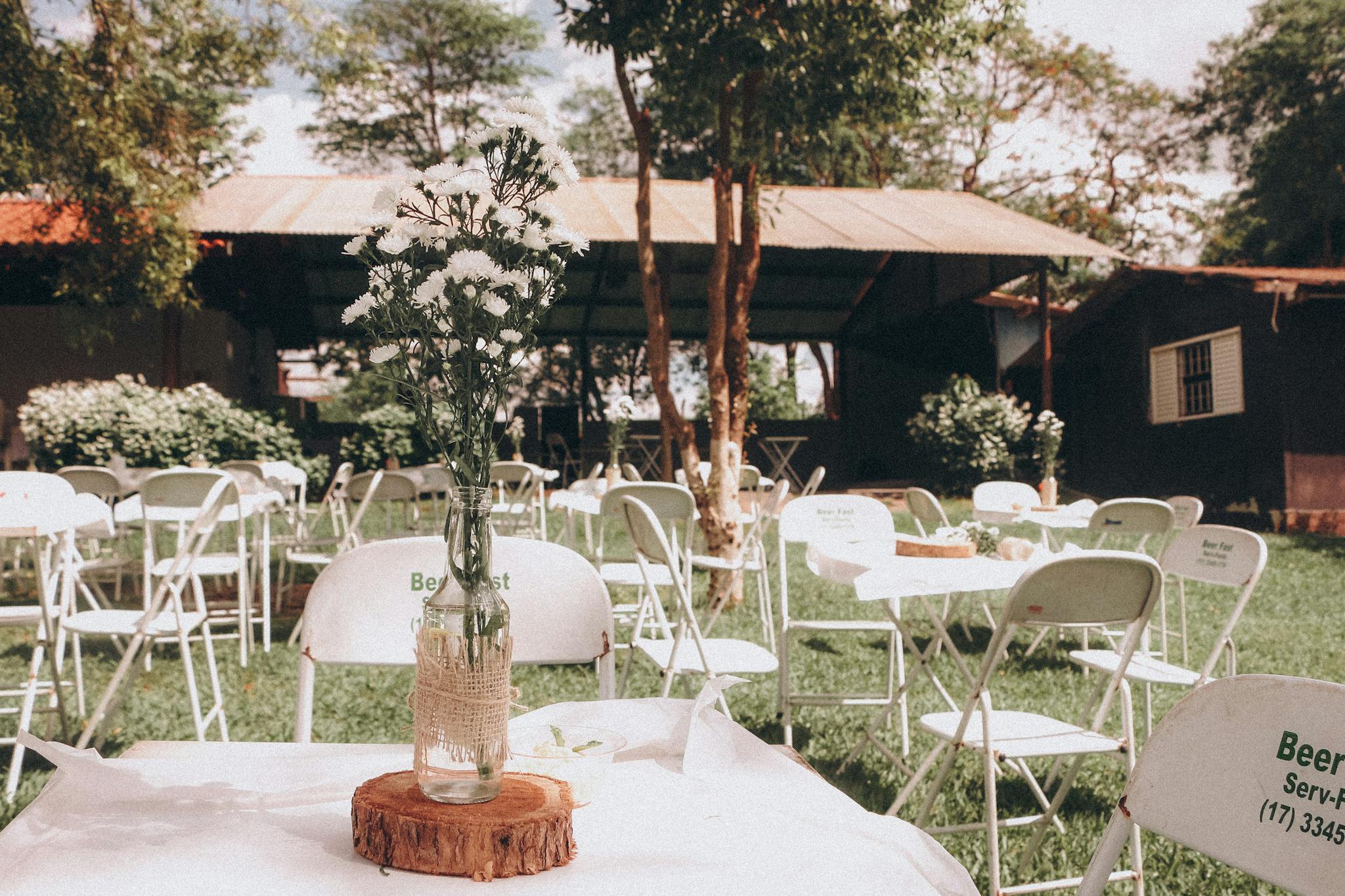 Outdoor event setup with tent and decor for event planning
